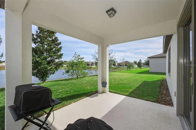 a front view of house with a garden