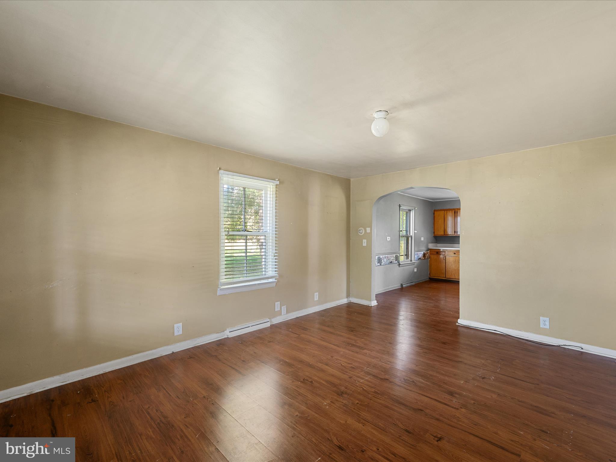 306 West 6th Avenue Ranson, WV 25438 - Photo 13 of 46 a view of a livingroom with wooden floor