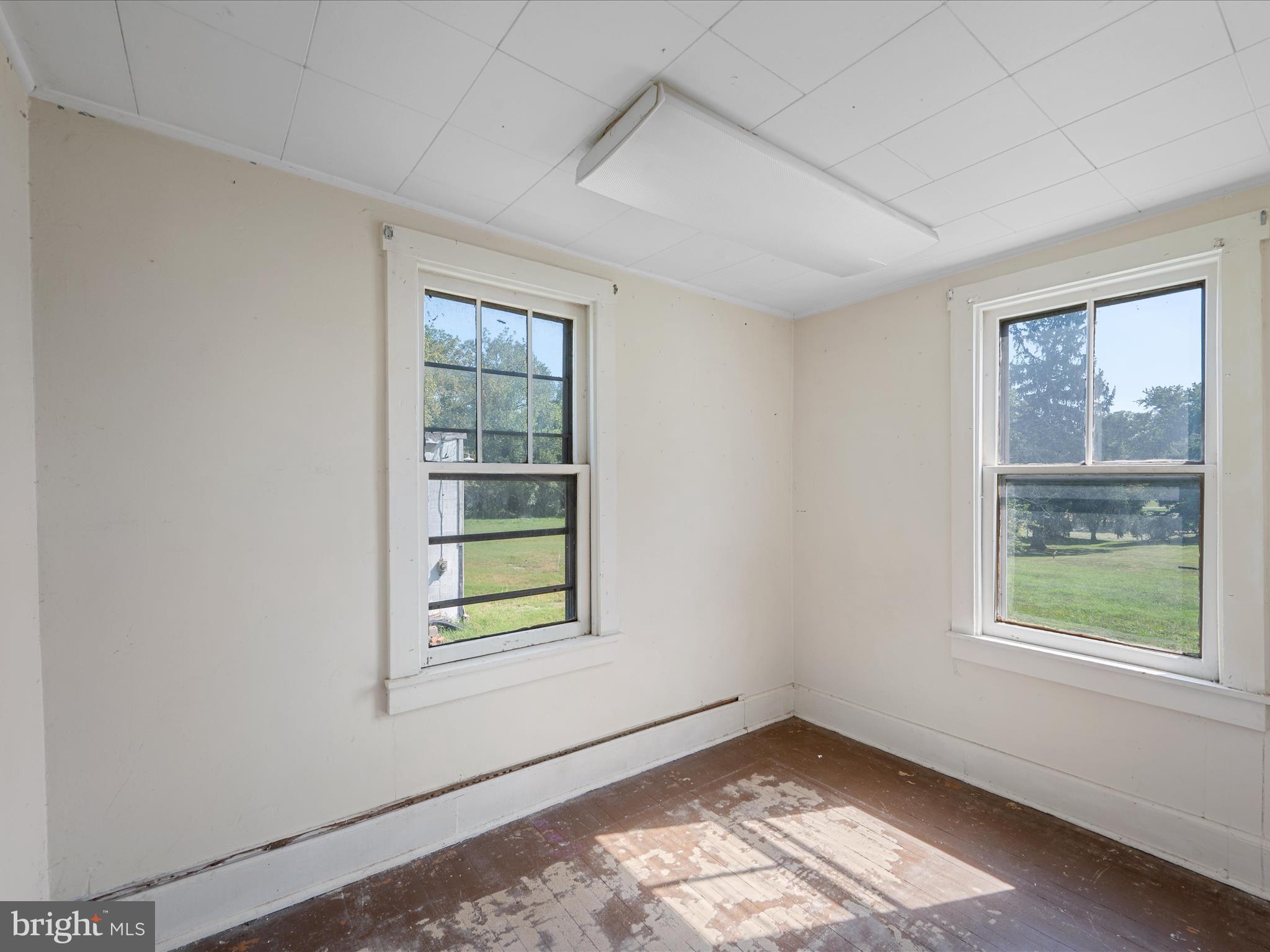 306 West 6th Avenue Ranson, WV 25438 - Photo 28 of 46 an empty room with windows