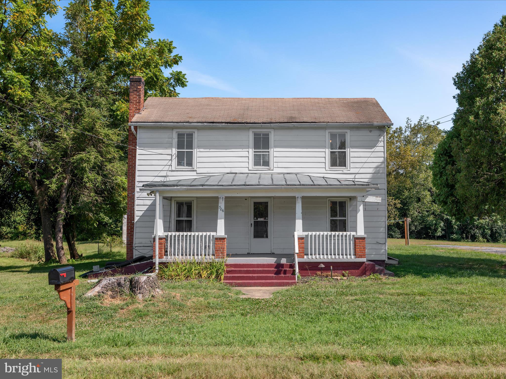 306 West 6th Avenue Ranson, WV 25438 - Photo 40 of 46 front view of a house with a yard