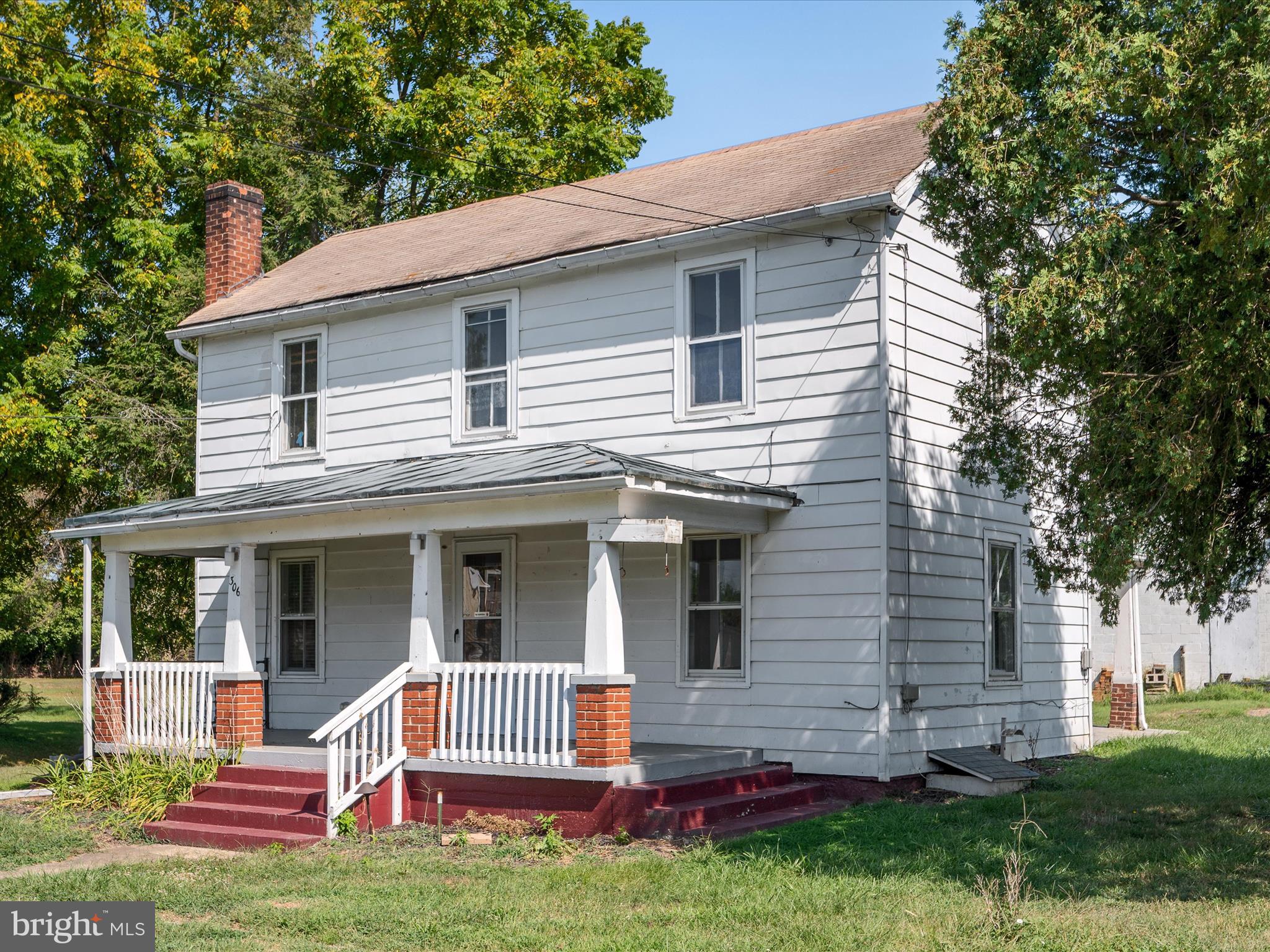 306 West 6th Avenue Ranson, WV 25438 - Photo 4 of 46 a view of house with a yard