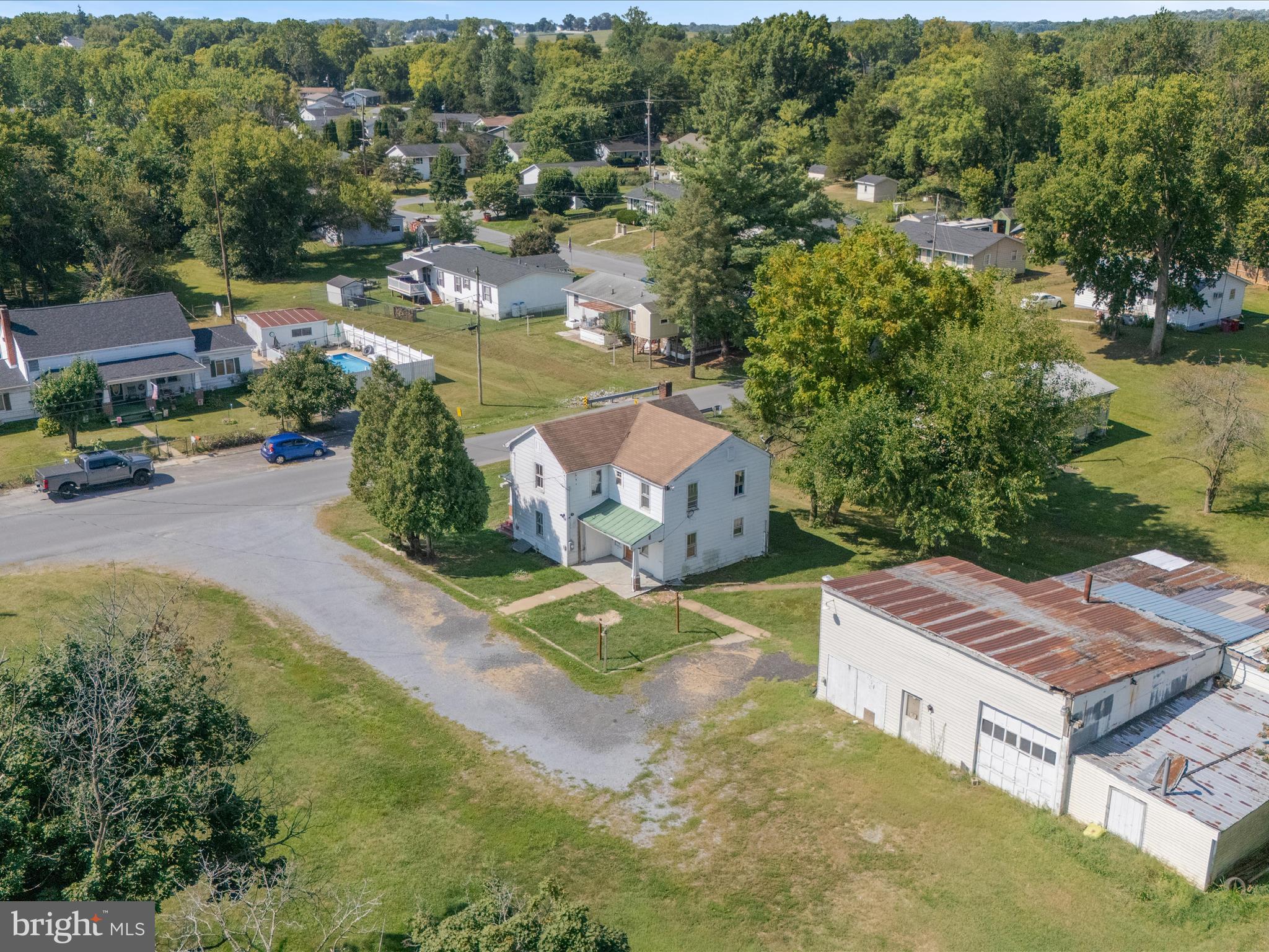 306 West 6th Avenue Ranson, WV 25438 - Photo 44 of 46 an aerial view of a house with a garden