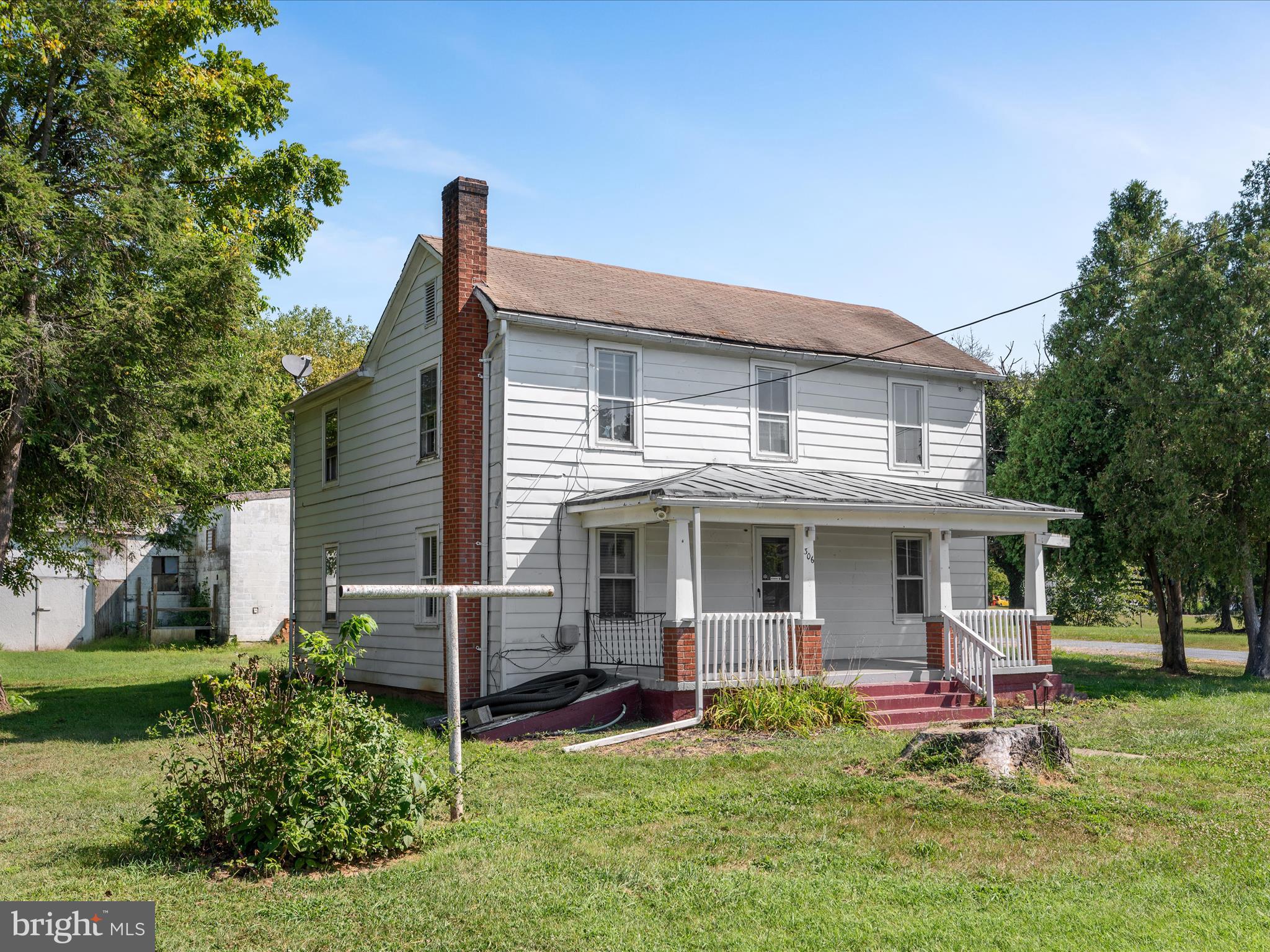 306 West 6th Avenue Ranson, WV 25438 - Photo 5 of 46 front view of a house with a yard