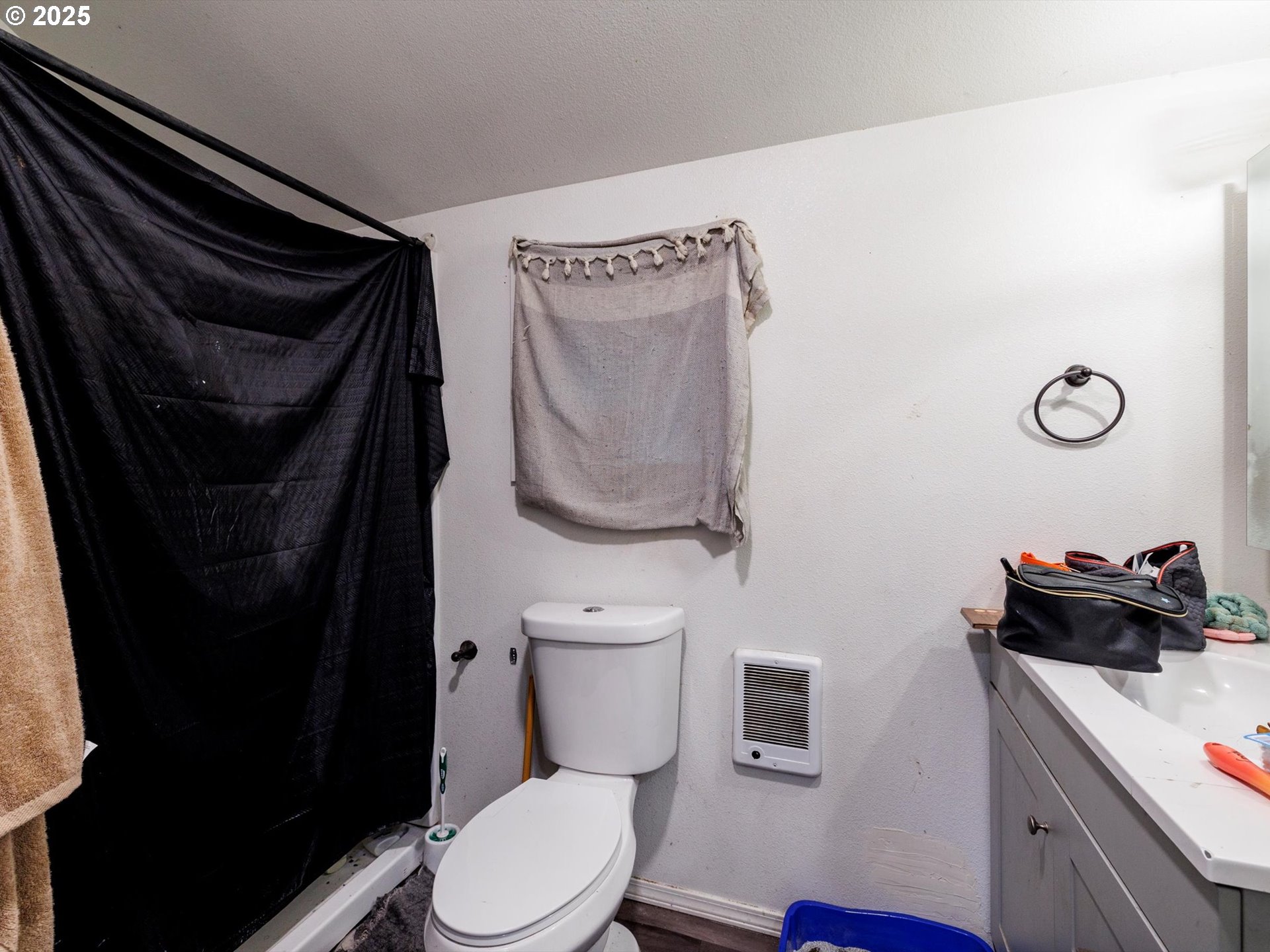 4840 Northeast 99th Avenue Portland, OR 97220 - Photo 8 of 15 a bathroom with a toilet a sink and vanity