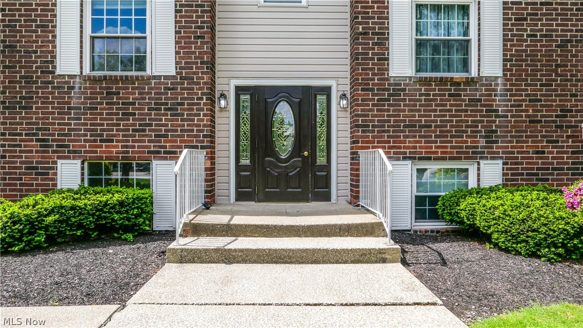 10790 Ravenna Road, Unit 101 Twinsburg, OH 44087 - Photo 2 of 27 Front door of the unit.