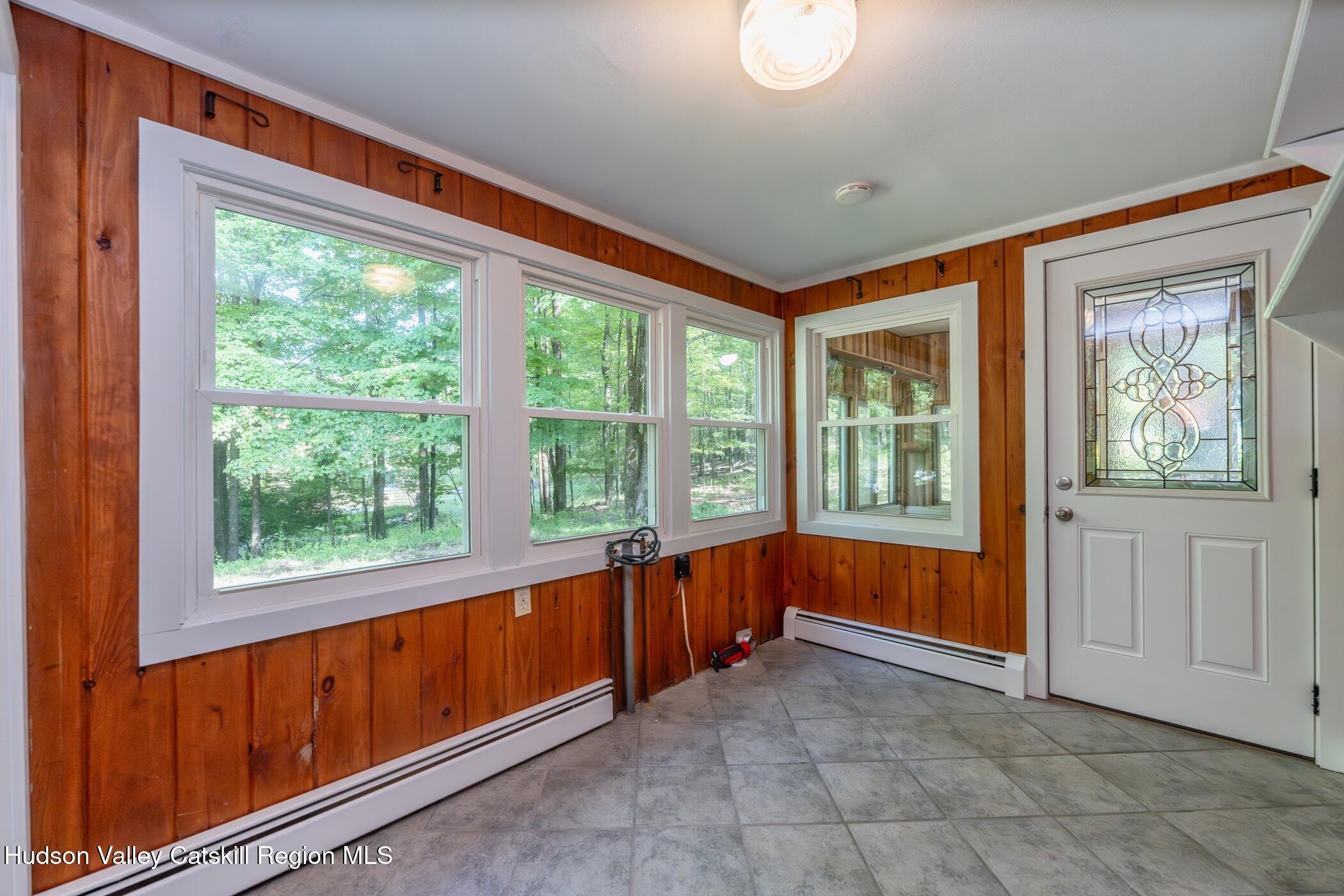 4533 Atwood Road Stone Ridge, NY 12484 - Photo 29 of 63 a view of an empty room with a window