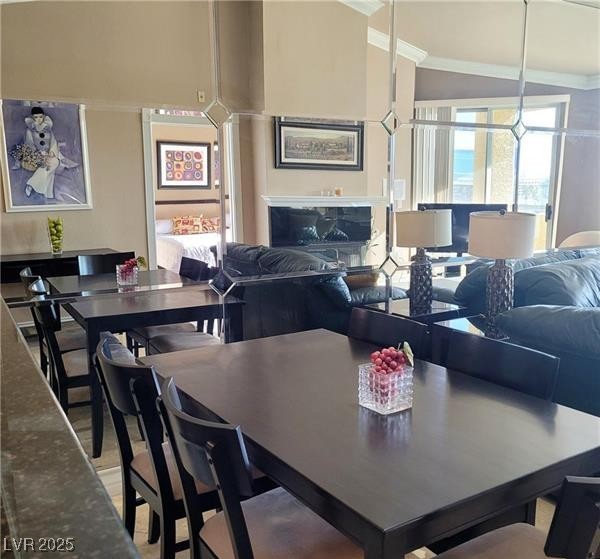 270 East Flamingo Road, Unit 414 Las Vegas, NV 89169 - Photo 2 of 8 Dining space featuring crown molding