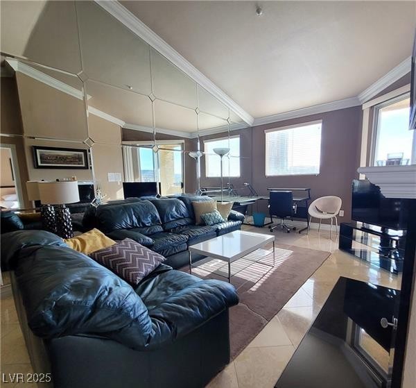 270 East Flamingo Road, Unit 414 Las Vegas, NV 89169 - Photo 3 of 8 Living room with vaulted ceiling, crown molding, and light tile patterned floors
