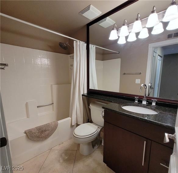 270 East Flamingo Road, Unit 414 Las Vegas, NV 89169 - Photo 7 of 8 Bathroom featuring vanity, shower / tub combo, and light tile patterned floors