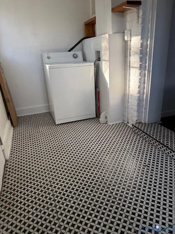 a view of a utility room with dryer