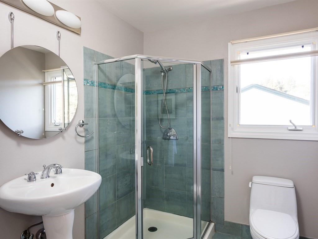 10 Kenton Avenue San Carlos, CA 94070 - Photo 14 of 25 a bathroom with a sink toilet and shower