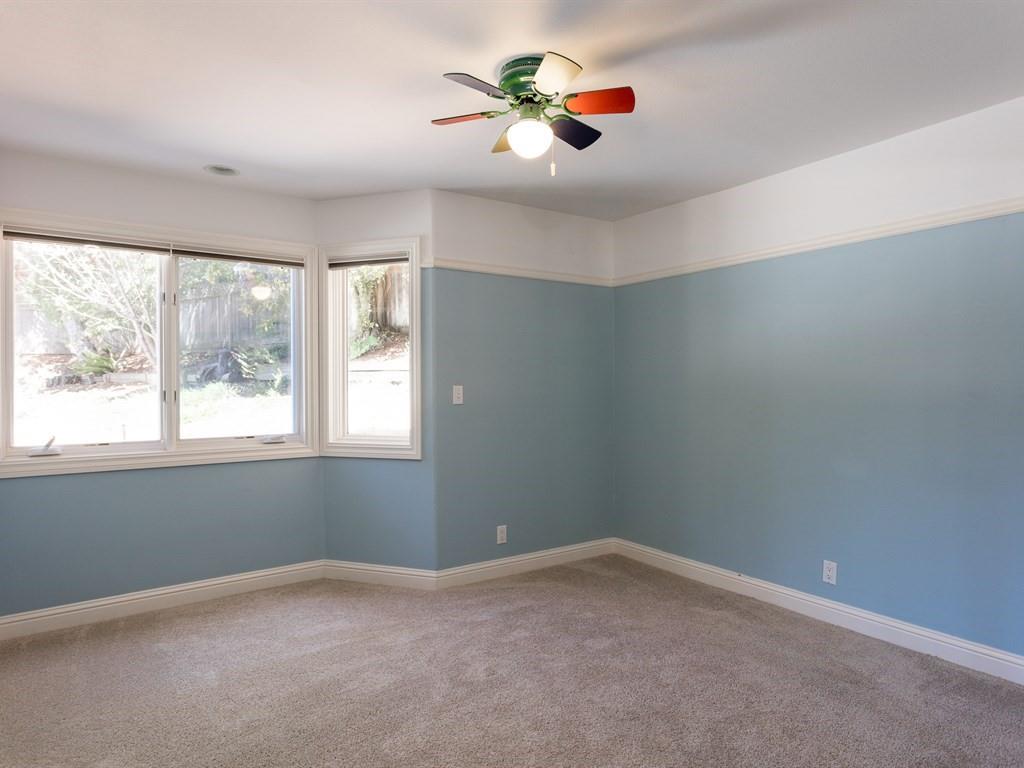10 Kenton Avenue San Carlos, CA 94070 - Photo 16 of 25 an empty room with a window