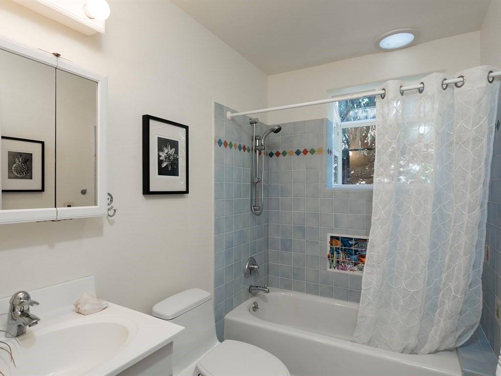 10 Kenton Avenue San Carlos, CA 94070 - Photo 17 of 25 a bathroom with a bathtub shower sink and toilet