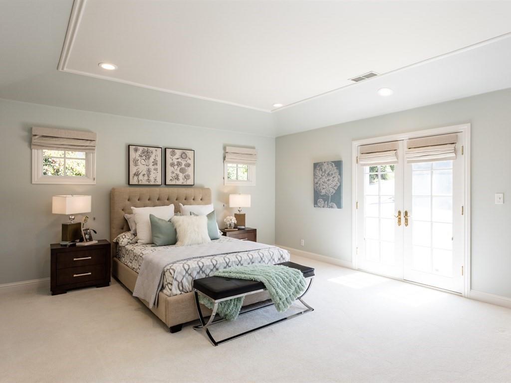 10 Kenton Avenue San Carlos, CA 94070 - Photo 20 of 25 a bedroom with a bed lamp and window