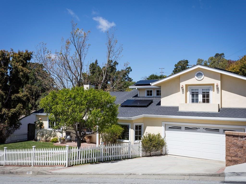 10 Kenton Avenue San Carlos, CA 94070 - Photo 2 of 25 a front view of a house with a yard