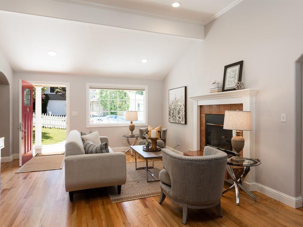 10 Kenton Avenue San Carlos, CA 94070 - Photo 5 of 25 a living room with furniture and a fireplace