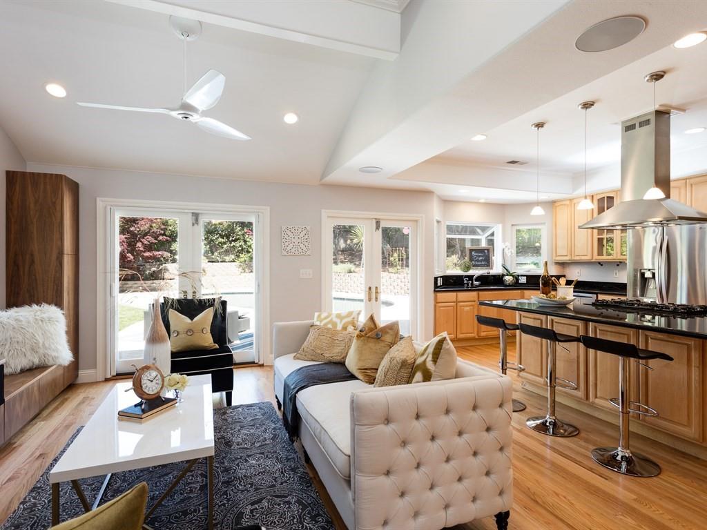 10 Kenton Avenue San Carlos, CA 94070 - Photo 9 of 25 a living room with furniture kitchen view and a large window