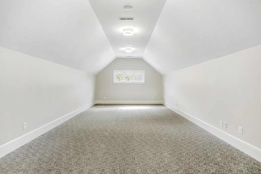 47 Fern Leaf Way Newnan, GA 30265 - Photo 36 of 65 an empty room with a empty space and windows