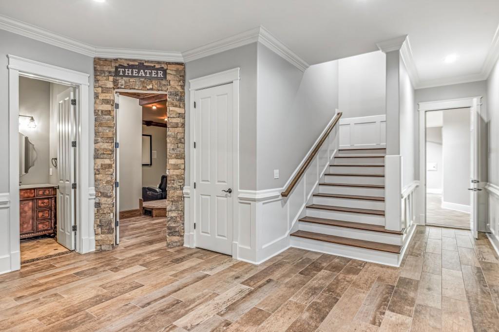 47 Fern Leaf Way Newnan, GA 30265 - Photo 43 of 65 a view of a hallway with wooden floor and entryway