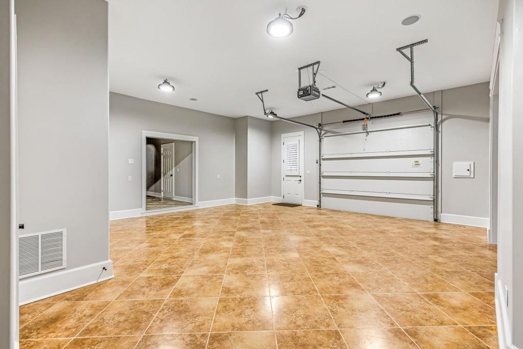 47 Fern Leaf Way Newnan, GA 30265 - Photo 55 of 65 a view of a room with a flat screen tv
