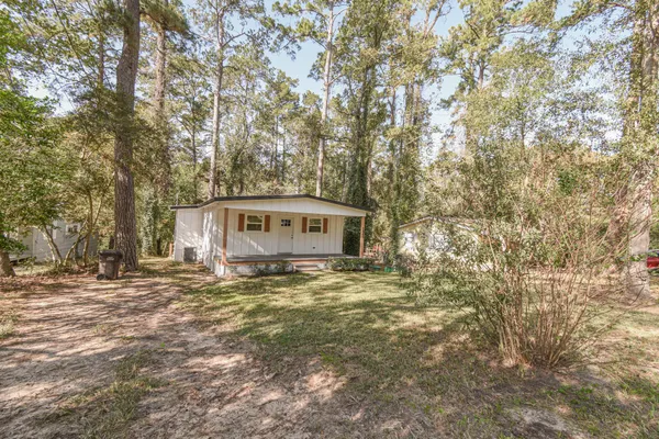 a view of house with outdoor space