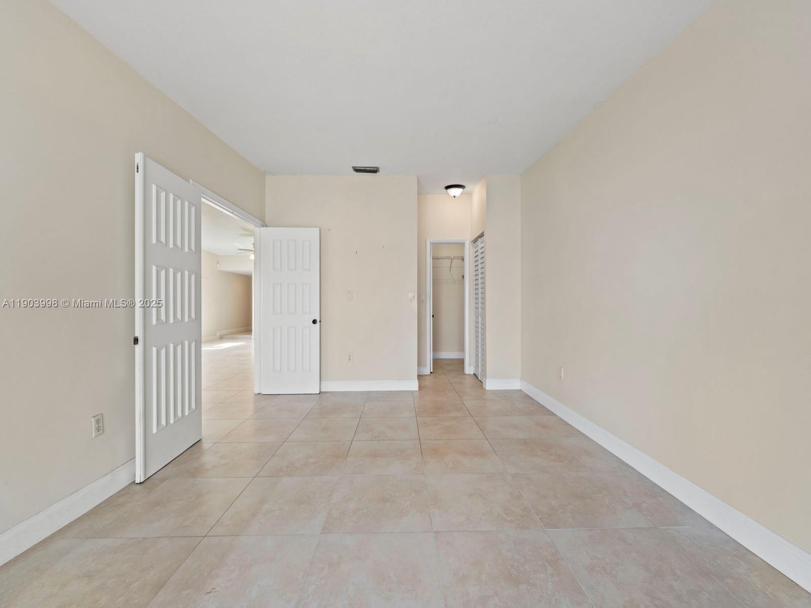 19233 Northwest 64th Court Hialeah, FL 33015 - Photo 15 of 34 a view of an empty room