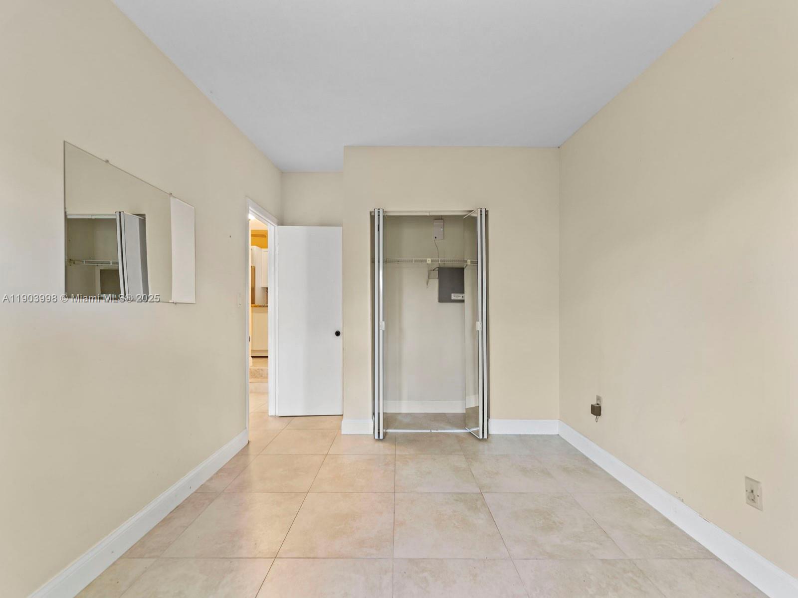 19233 Northwest 64th Court Hialeah, FL 33015 - Photo 24 of 34 a view of an empty room