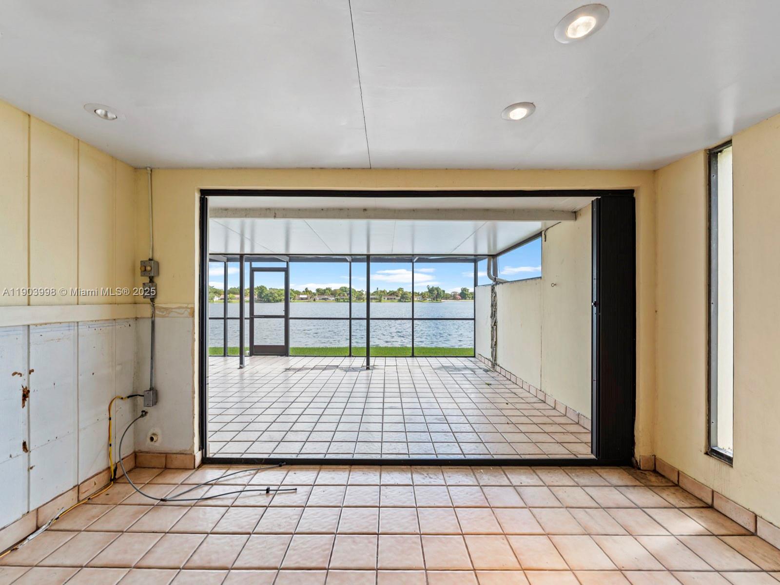 19233 Northwest 64th Court Hialeah, FL 33015 - Photo 28 of 34 a view of an empty room and window