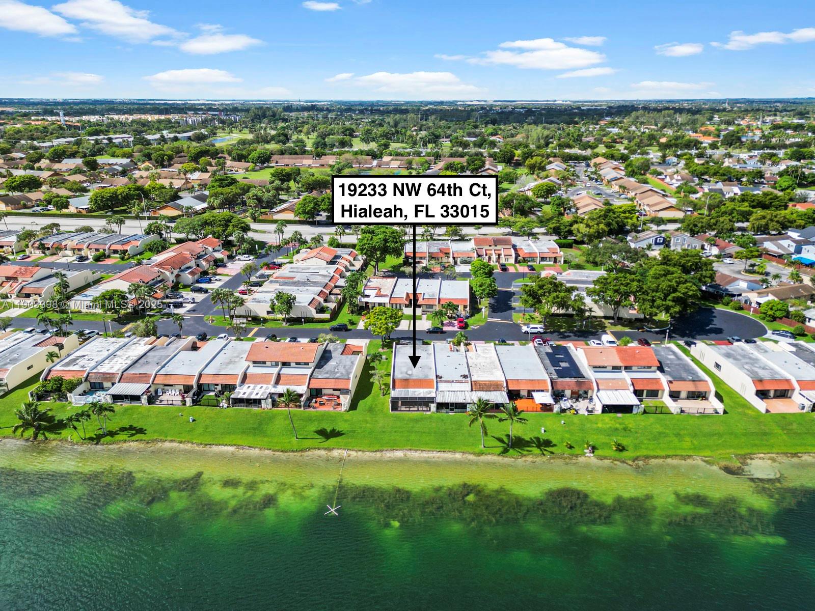 19233 Northwest 64th Court Hialeah, FL 33015 - Photo 7 of 34 a view of a city