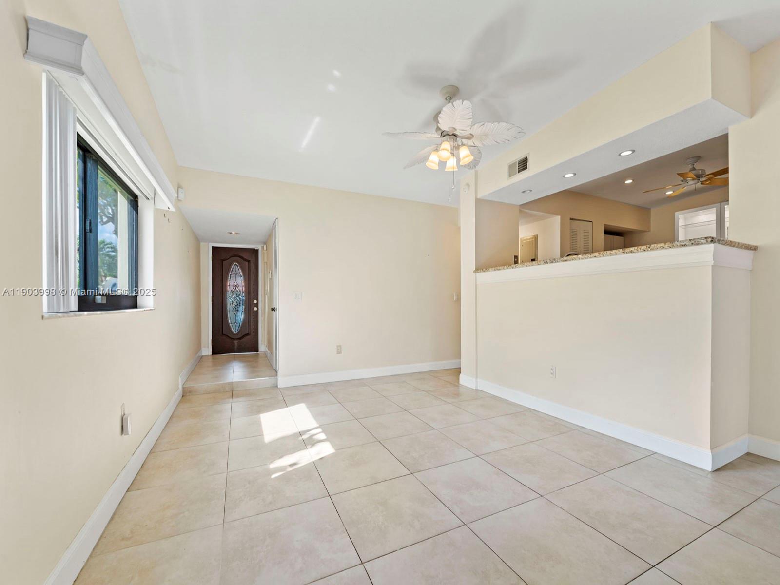 19233 Northwest 64th Court Hialeah, FL 33015 - Photo 10 of 34 a view of livingroom with hardwood