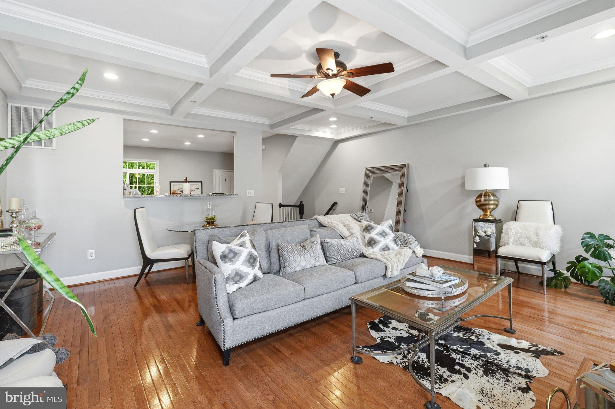 772 Raven Avenue Gaithersburg, MD 20877 - Photo 12 of 30 a living room with furniture and a wooden floor