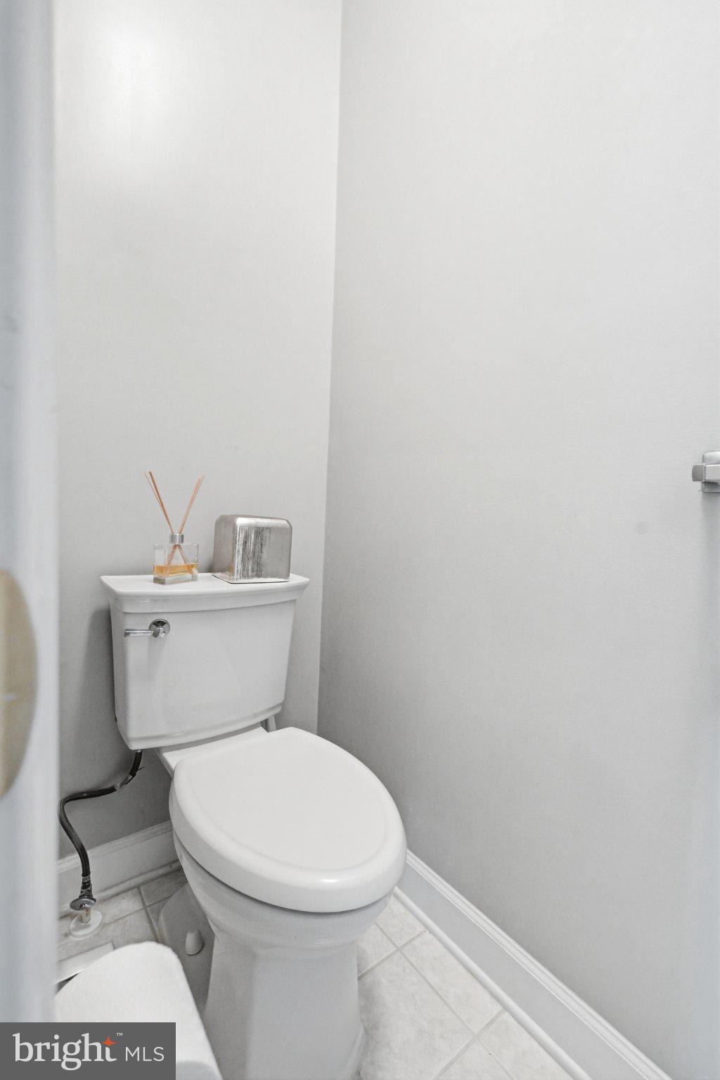772 Raven Avenue Gaithersburg, MD 20877 - Photo 20 of 30 a white toilet sitting next to a white sink