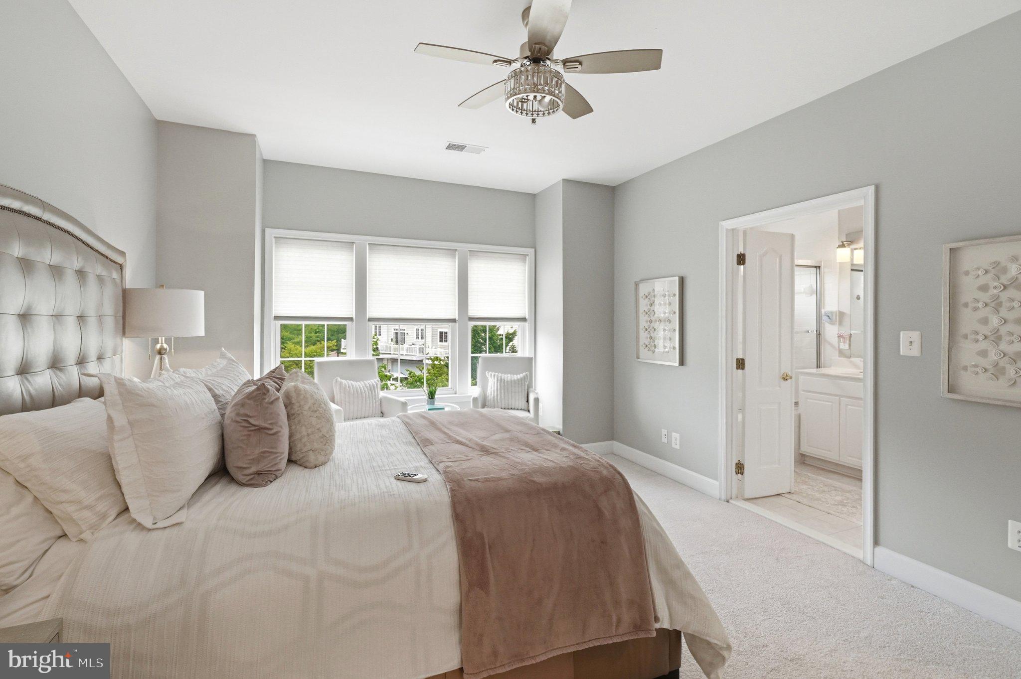 772 Raven Avenue Gaithersburg, MD 20877 - Photo 24 of 30 a bedroom with a beds and large window