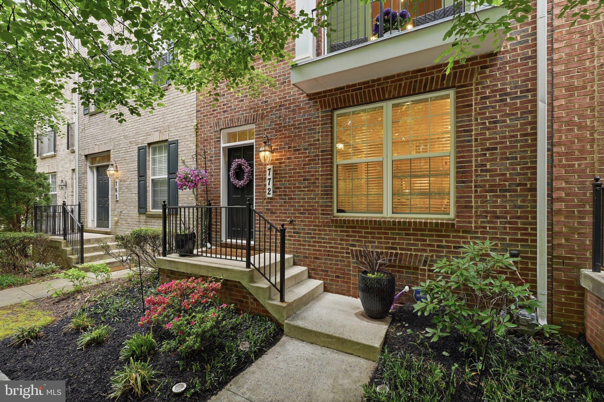 772 Raven Avenue Gaithersburg, MD 20877 - Photo 29 of 30 a front view of a house with garden