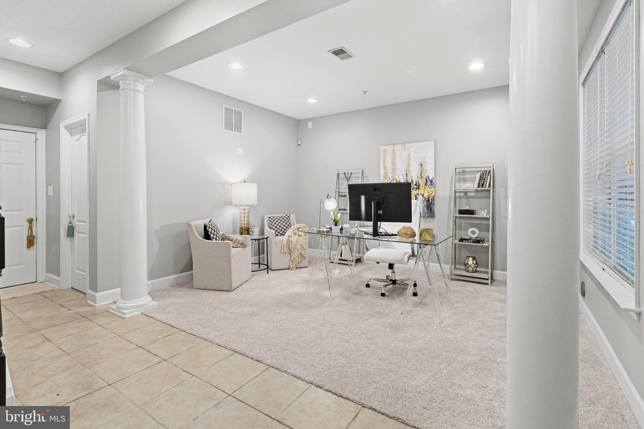 772 Raven Avenue Gaithersburg, MD 20877 - Photo 3 of 30 a living room with furniture and a flat screen tv