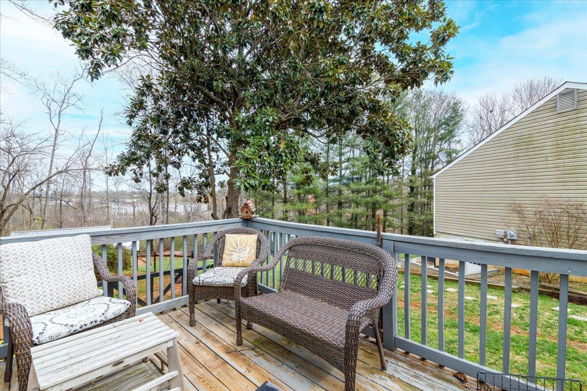 148 Cobblestone Drive Lynchburg, VA 24502 - Photo 17 of 30 a view of a two chairs in the deck
