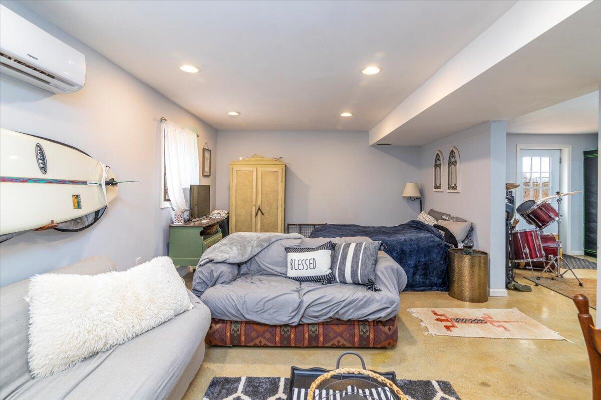 148 Cobblestone Drive Lynchburg, VA 24502 - Photo 21 of 30 a living room with furniture and a wooden floor