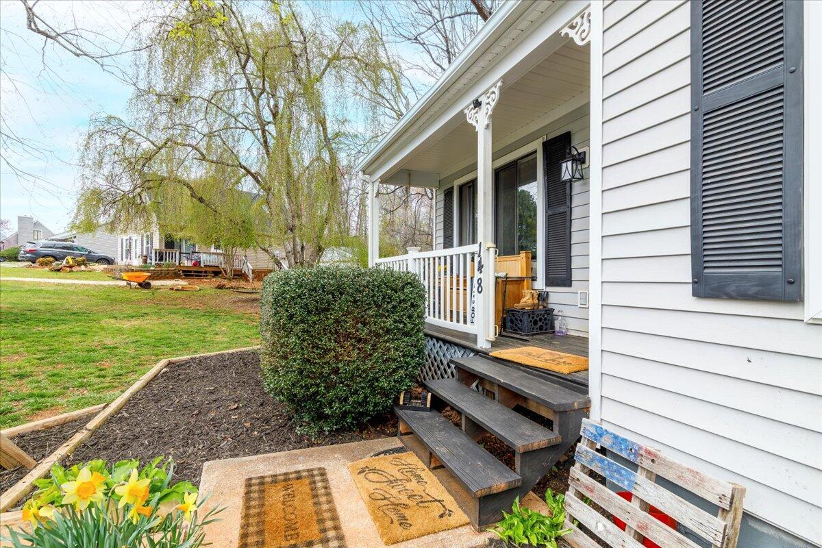 148 Cobblestone Drive Lynchburg, VA 24502 - Photo 4 of 30 a view of a backyard with sitting area