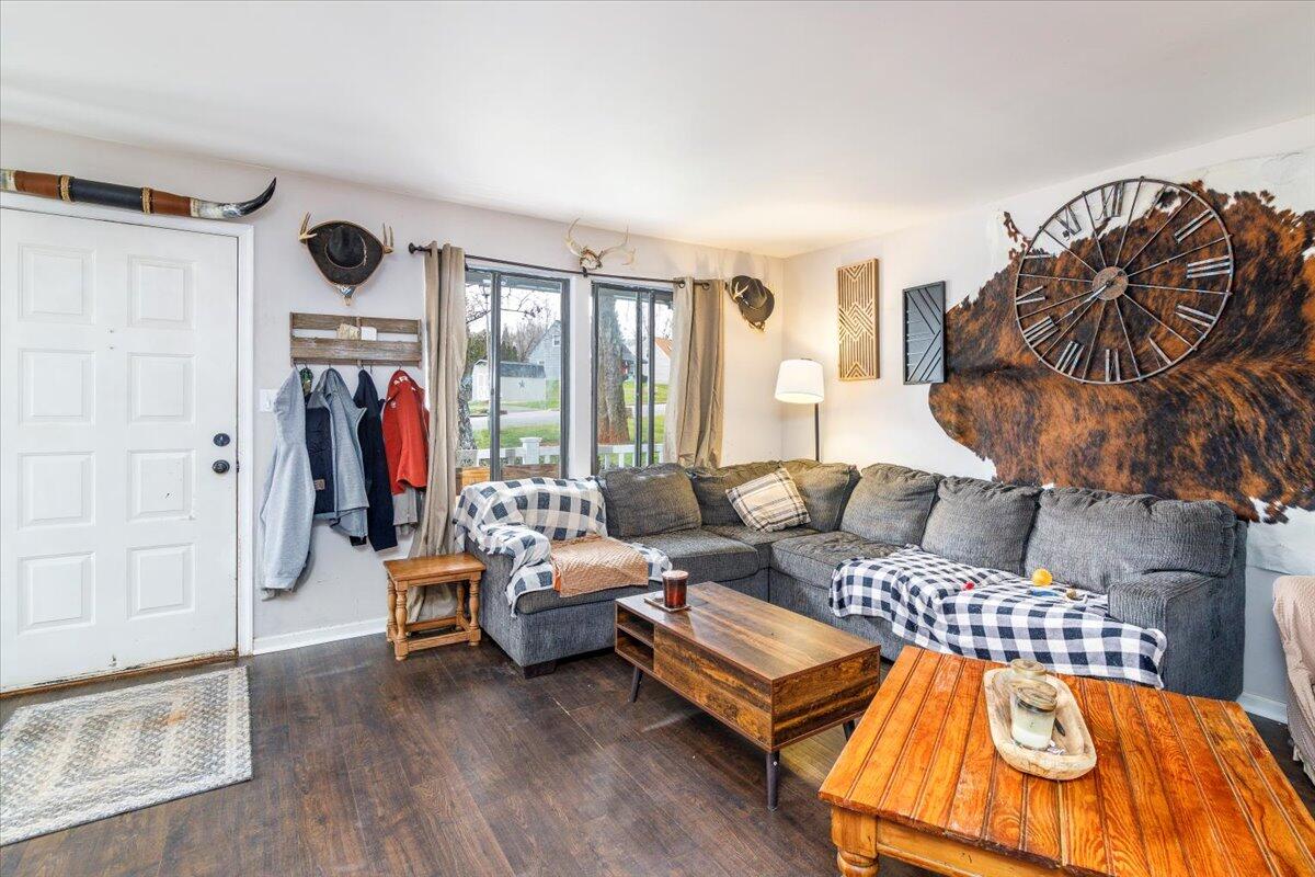 148 Cobblestone Drive Lynchburg, VA 24502 - Photo 6 of 30 a living room with furniture a rug and a flat screen tv