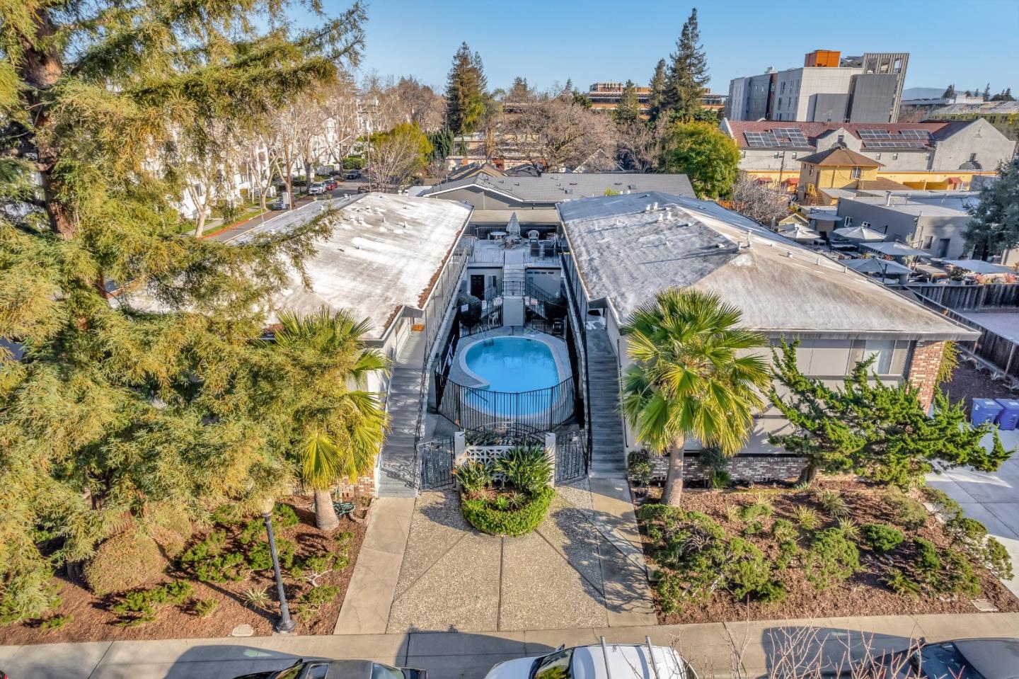 a picture of a table and chairs on the wooden floor