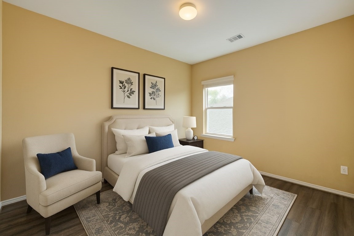 4411 Enchanted Spring Court Sugar Land, TX 77479 - Photo 15 of 21 a bedroom with a bed couch and a window