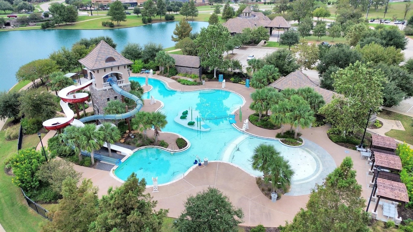 4411 Enchanted Spring Court Sugar Land, TX 77479 - Photo 21 of 21 an aerial view of a house with outdoor space and lake view