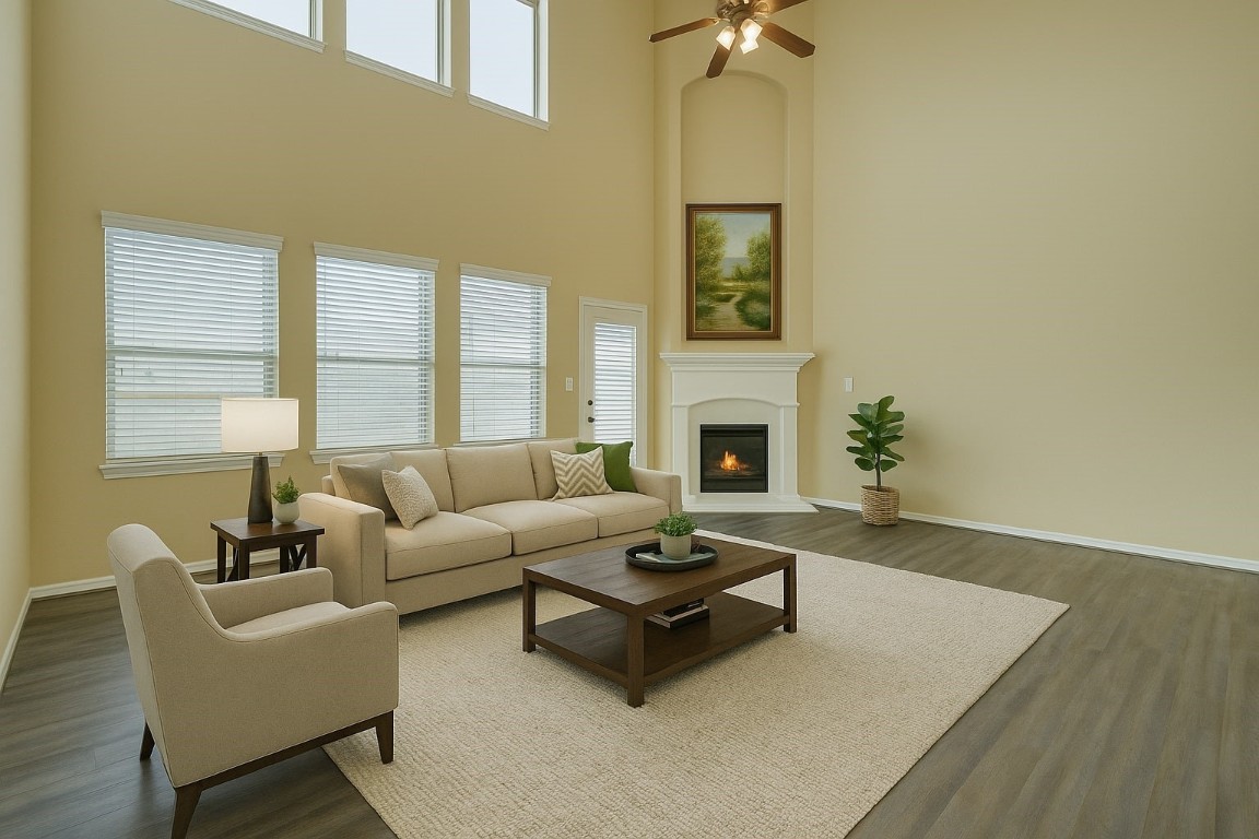 4411 Enchanted Spring Court Sugar Land, TX 77479 - Photo 6 of 21 a living room with furniture and a fireplace