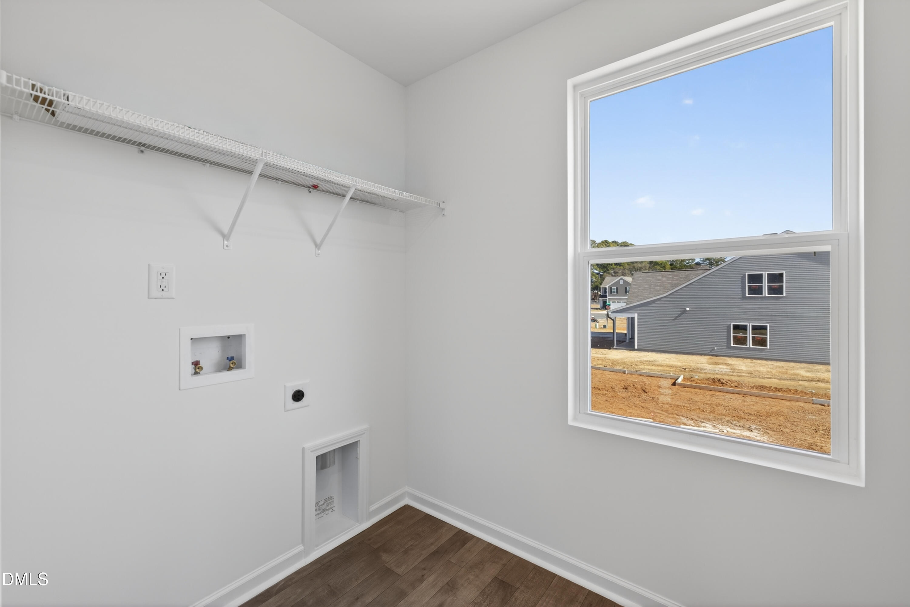 415 Plentiful Way, Unit 108 Benson, NC 27504 - Photo 29 of 31 a view of an empty room with a window