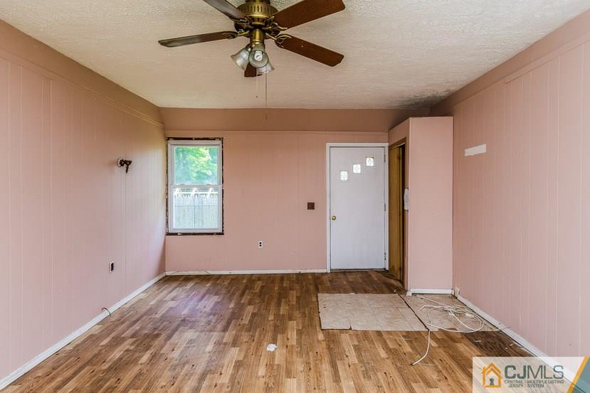 78 Old Road Princeton, NJ 08540 - Photo 3 of 20 wooden floor in an empty room with a window