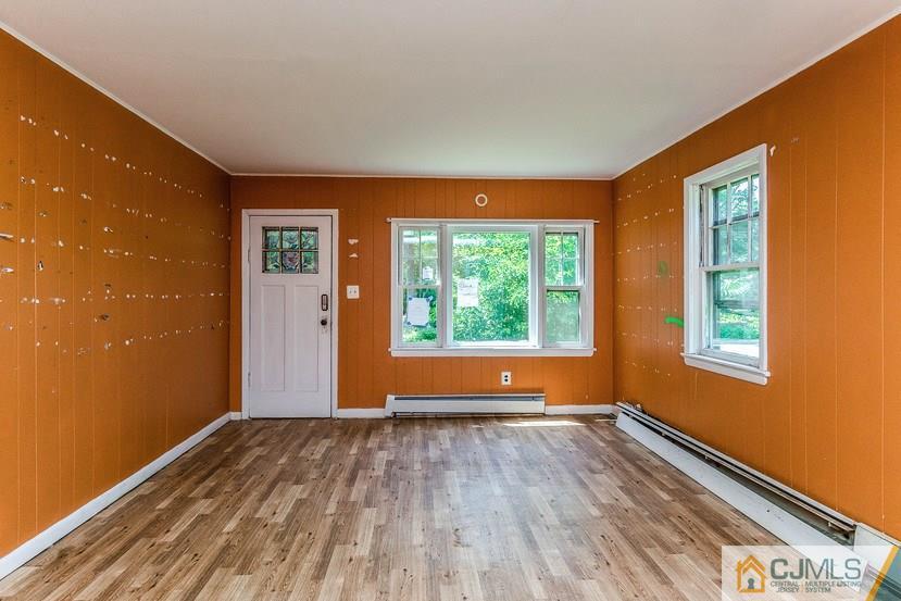 78 Old Road Princeton, NJ 08540 - Photo 5 of 20 a view of room with window and wooden floor