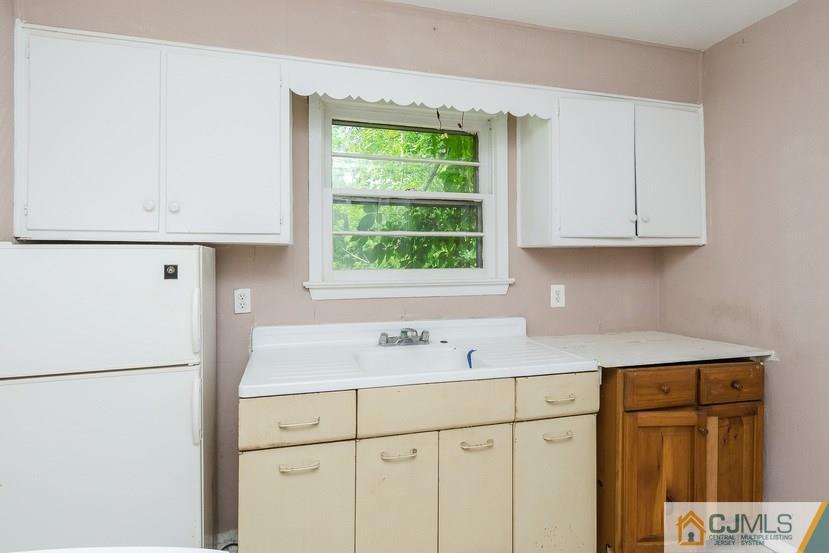78 Old Road Princeton, NJ 08540 - Photo 10 of 20 a kitchen with a sink cabinets and a refrigerator