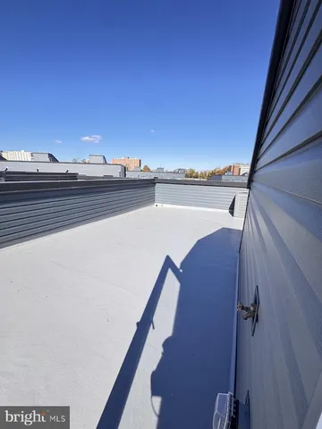 a view of a house with roof deck