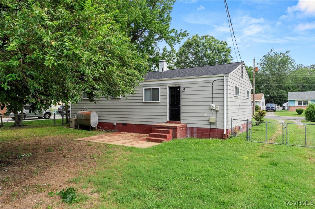 5425 Germain Road Richmond, VA 23224 - Photo 14 of 37 Back of property featuring heating fuel, a gate, a