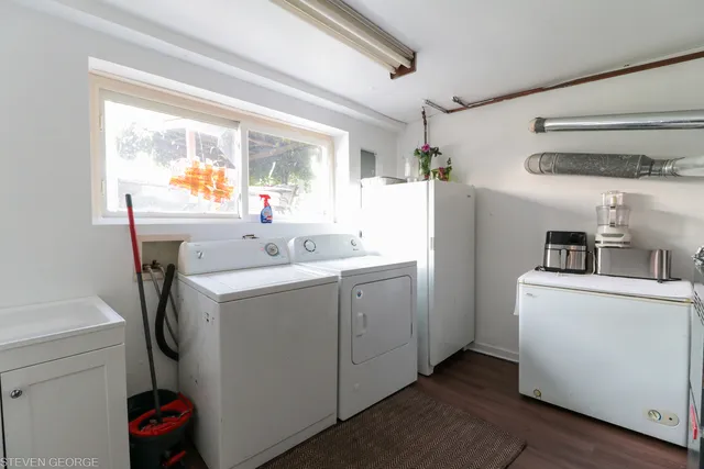a utility room with dryer and washer